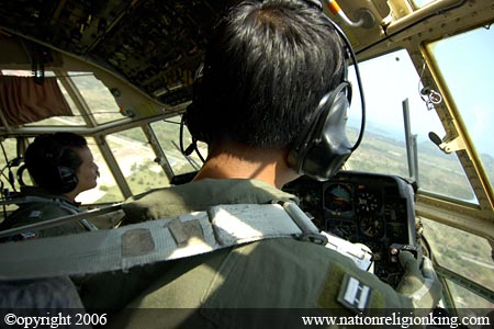 Royal Thai Air Force: Thai Air Force C-130H flying over Ao Manao, Pretchuap Khiri Khan Province