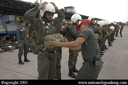 Border Patrol Police: Members of the Royal Thai Police preparing for a static line jump. Hua Hin, Thailand.