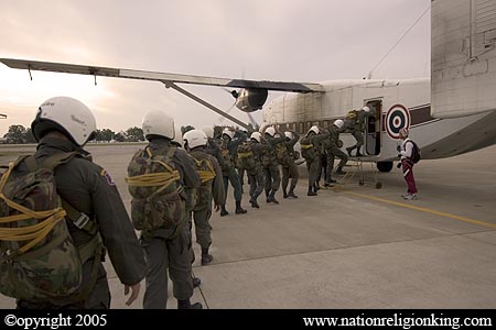 Border Patrol Police: Members of the Royal Thai Police preparing for a static line jump. Hua Hin, Thailand.