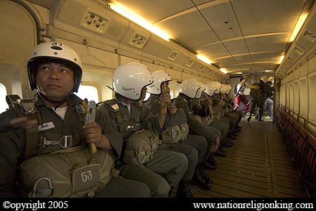 Border Patrol Police: Members of the Royal Thai Police preparing for a static line jump. Hua Hin, Thailand.