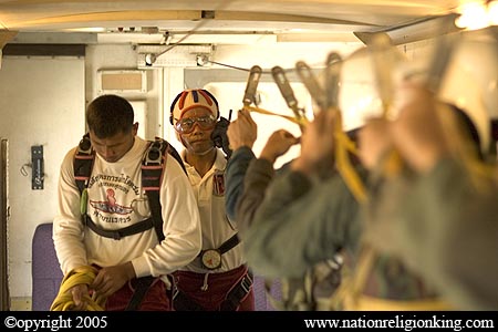 Border Patrol Police: Members of the Royal Thai Police preparing for a static line jump. Hua Hin, Thailand.