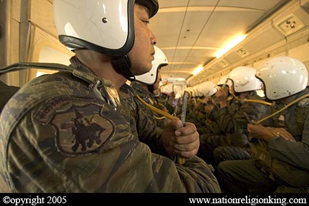 Border Patrol Police: Members of the Royal Thai Police preparing for a static line jump. Hua Hin, Thailand.