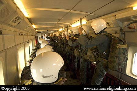 Border Patrol Police: Members of the Royal Thai Police preparing for a static line jump. Hua Hin, Thailand.